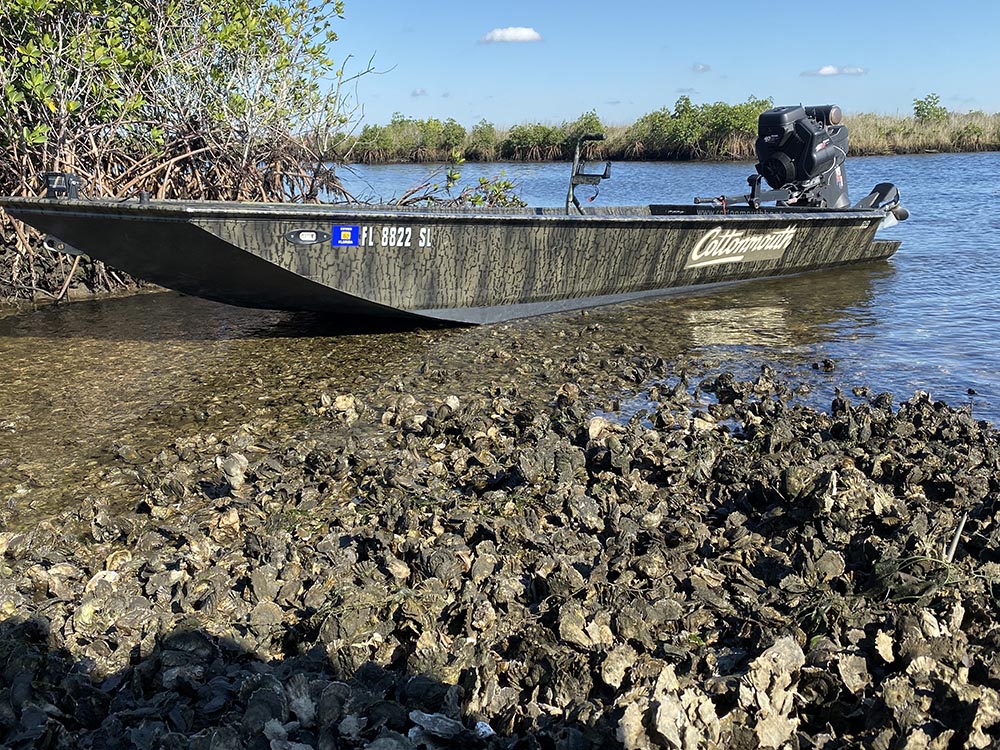 a picture of an extremely shallow drafting inshore fishing boat